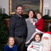 Family of 5 with Santa.